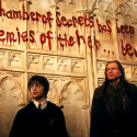 Movie still from Harry Potter 2 saying "The Chamber of Secrets has been opened. Enemies of the heir beware."